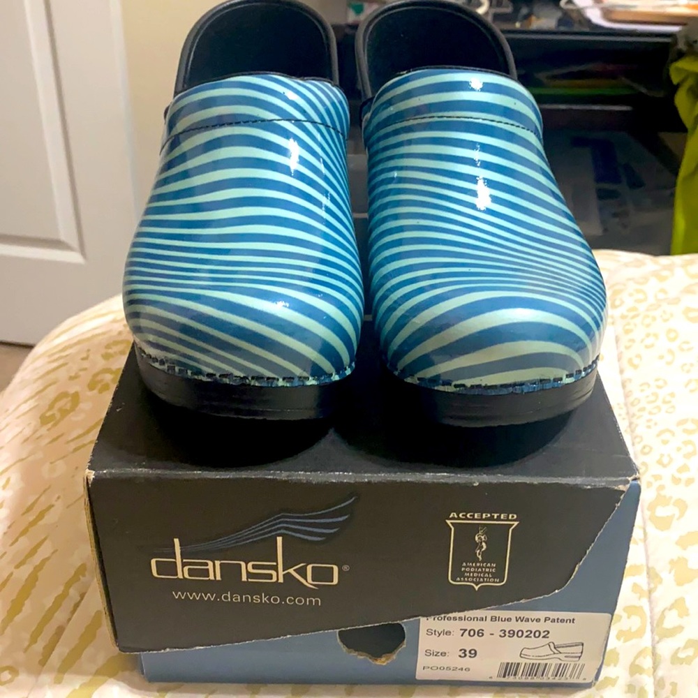 Brand new Danskos nursing clogs size 39.